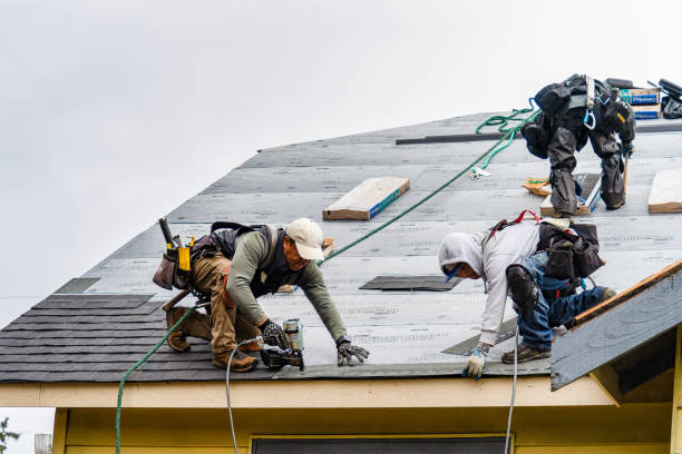 Professional Roofing technician working in Port Washington, NY